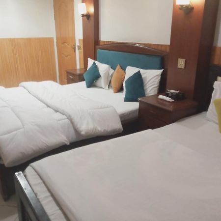 Hotel New Mid City Multan Bagian luar foto