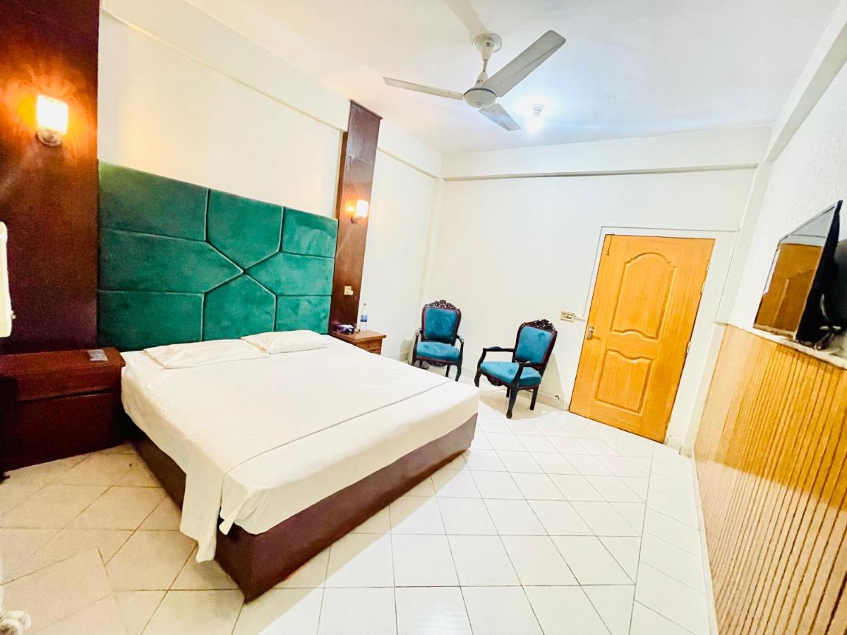 Hotel New Mid City Multan Bagian luar foto