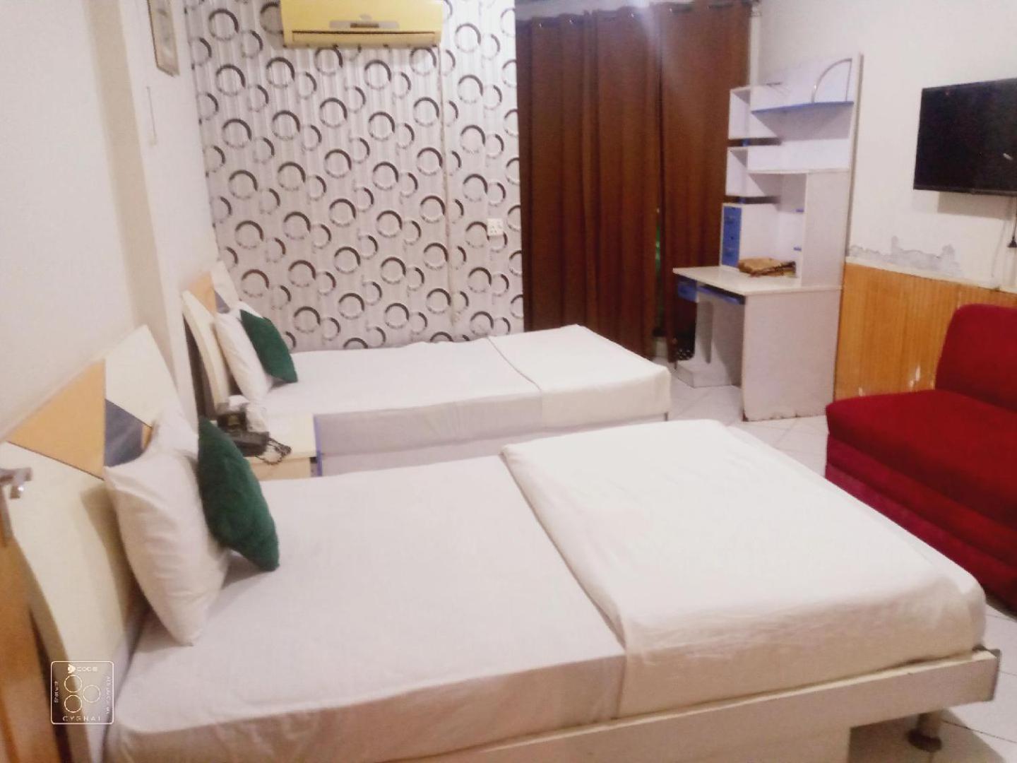 Hotel New Mid City Multan Bagian luar foto